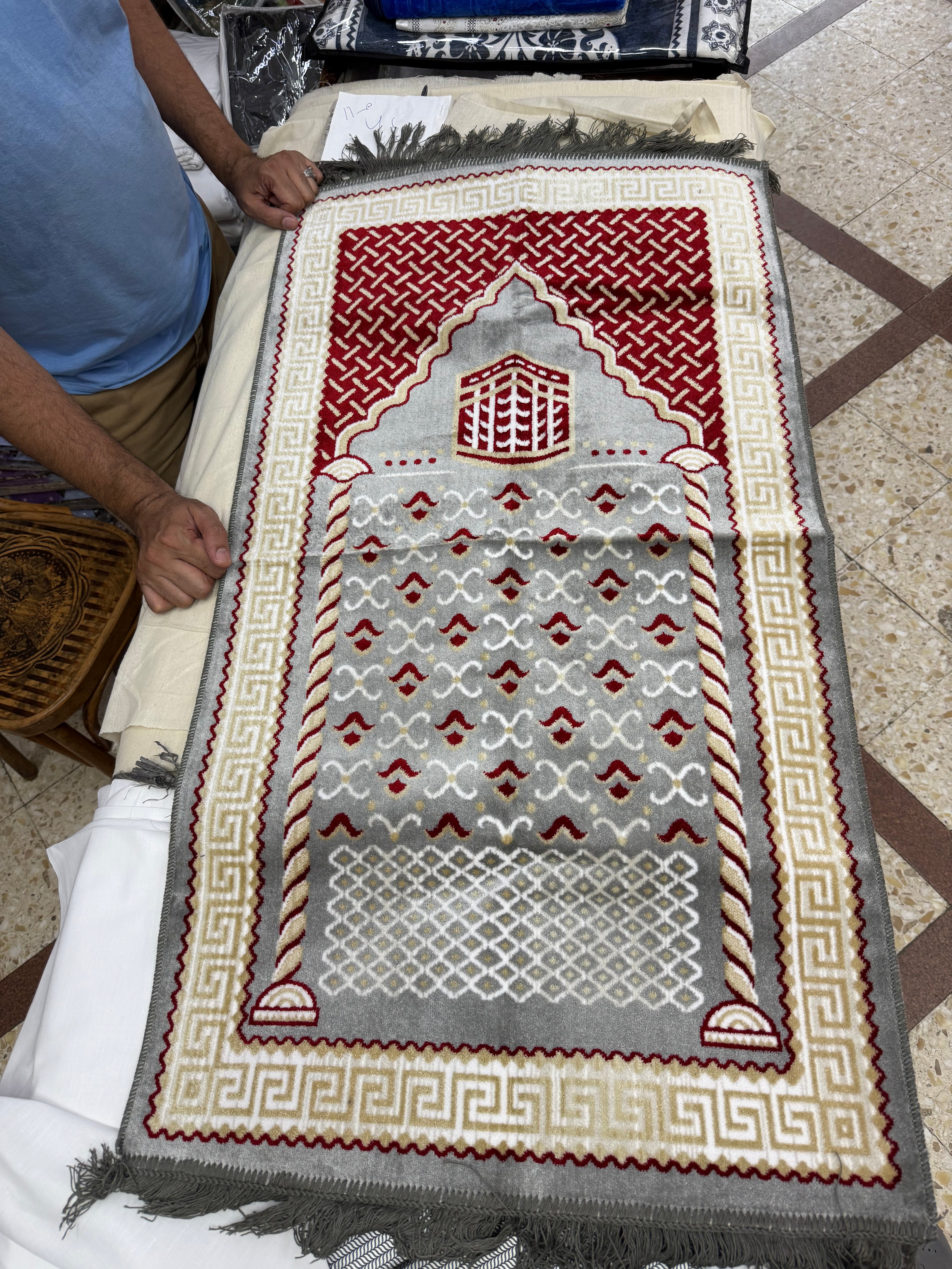 سجادة صلاة النساجون